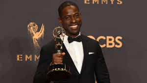 Sterling K Brown Candid Shot - Capturing The Essence Of Talent And Appeal Wallpaper