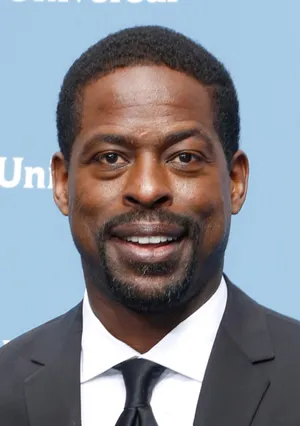 Sterling K Brown Looks Cool And Confident In Front Of The Camera Wallpaper