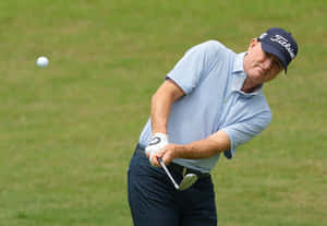 Steve Flesch Displaying A Golf Swing Technique Wallpaper