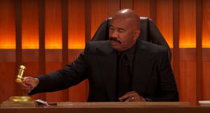 Steve Harvey In A Black Suit Wallpaper