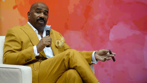 Steve Harvey In A Yellow Suit Wallpaper