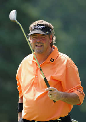 Steve Lowery Donning Bright Orange Shirt Wallpaper