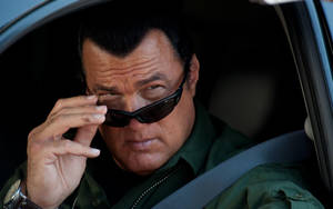 Steven Seagal In His Role As Reserve Deputy Chief Wallpaper