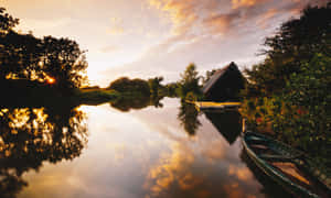 Still Waters Of The Lake In Norfolk Broads Wallpaper