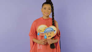 Storm Reid Holding Emoji Props Wallpaper