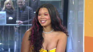 Storm Reid Smiling During Interview Wallpaper