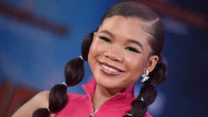 Storm Reid Smiling Event Appearance Wallpaper