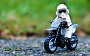 Stormtrooper Figureon Motorcycle Toy Wallpaper