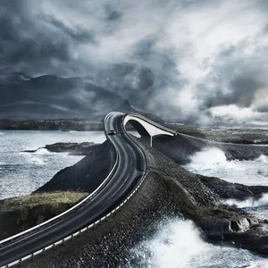 Storseisundet Bridge With Dark Clouds Wallpaper
