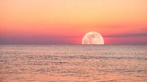 Strawberry Moon Over Ocean Wallpaper