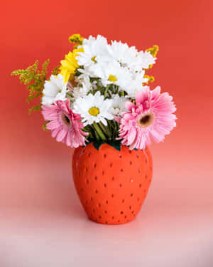 Strawberry Vasewith Colorful Flowers Wallpaper