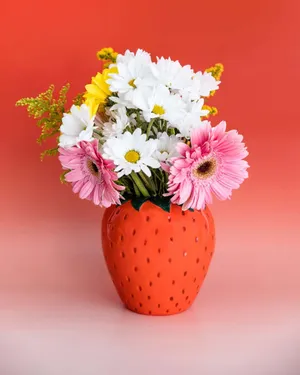 Strawberry Vasewith Colorful Flowers Wallpaper