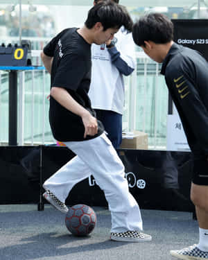 Street Soccer Playersin Action.jpg Wallpaper