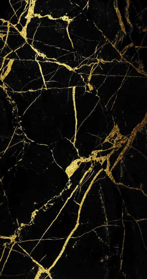 Striking Aesthetic Of Black And Gold Wallpaper