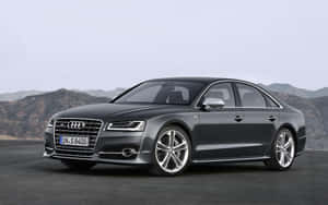 Striking Audi S8 Luxury Sports Sedan In Beautiful Landscape Wallpaper