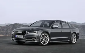 Striking Audi S8 Luxury Sports Sedan In Beautiful Landscape Wallpaper