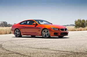 Striking Bmw M6 Coupe In Action Wallpaper