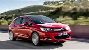 Striking Citroen C4 In Vibrant Red Color Wallpaper