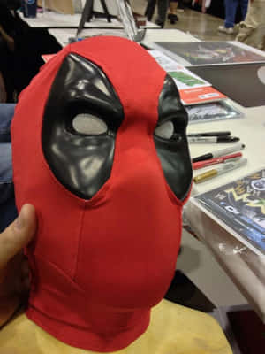 Striking Deadpool Mask Wallpaper Wallpaper