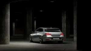 Striking Genesis G70 At Sunset Wallpaper