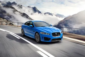 Striking Jaguar Xfr In Motion Wallpaper
