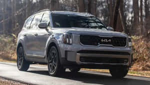 Striking Kia Telluride In A Vibrant Sunset Wallpaper