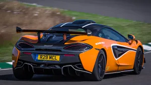 Striking Mclaren 620r On Display Wallpaper