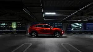 Striking Mitsubishi Eclipse On The Road Wallpaper