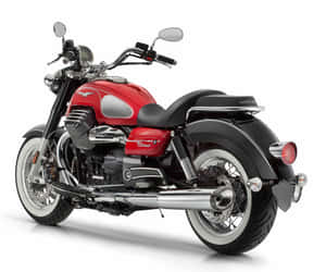 Striking Moto Guzzi Motorcycle On The Open Road Wallpaper