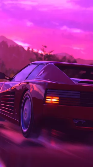 Striking Red Ferrari Testarossa On Open Road Wallpaper