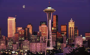 Striking View Of Seattle Skyline At Night Wallpaper