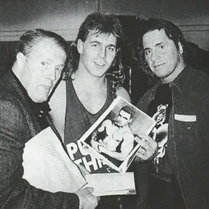 Stu Hartand Sons Holding Photo Wallpaper