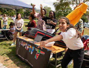 Students Engaging At Booth, Carnegie Mellon University Wallpaper