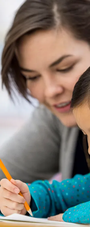 Studious Girl With Teacher Wallpaper
