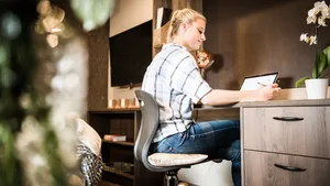 Studious Woman Laptop Wallpaper