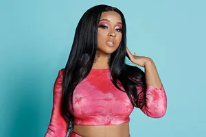 Stunna Girl Pink Top Blue Backdrop Wallpaper