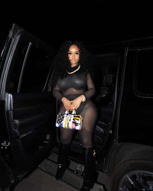 Stunna Girl Posingwith Luxury Carat Night Wallpaper