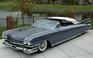 Stunning 1959 Cadillac Eldorado In Sunset Orange Wallpaper