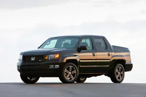 Stunning 2021 Honda Ridgeline Driving On A Scenic Road Wallpaper