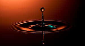 Stunning 3d Water Splash On A Serene Ocean Surface Wallpaper