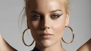 Stunning Abbie Cornish In Elegant Attire Wallpaper