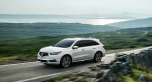 Stunning Acura Mdx In A Scenic Destination Wallpaper