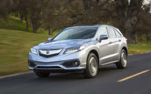 Stunning Acura Rdx On A Scenic Mountain Road Wallpaper