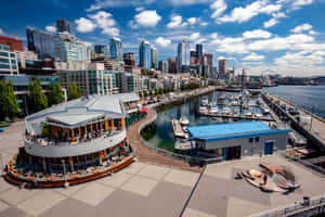 Stunning Aerial View Of Beautiful City At Sunset Wallpaper