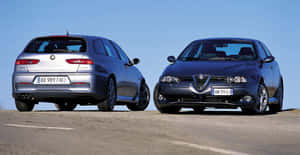 Stunning Alfa Romeo 156 On The Open Road Wallpaper