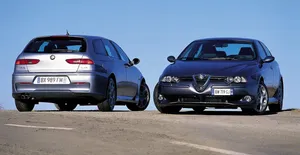 Stunning Alfa Romeo 156 On The Open Road Wallpaper