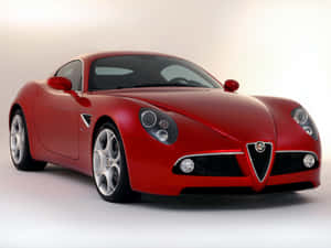 Stunning Alfa Romeo 8c Competizione In Action Wallpaper