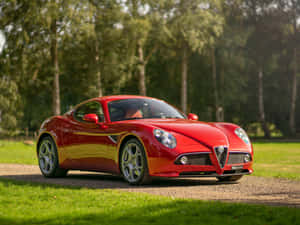 Stunning Alfa Romeo 8c Competizione In Action Wallpaper