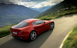 Stunning Alfa Romeo 8c Competizione In Action Wallpaper