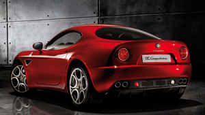 Stunning Alfa Romeo 8c Competizione In Motion Wallpaper